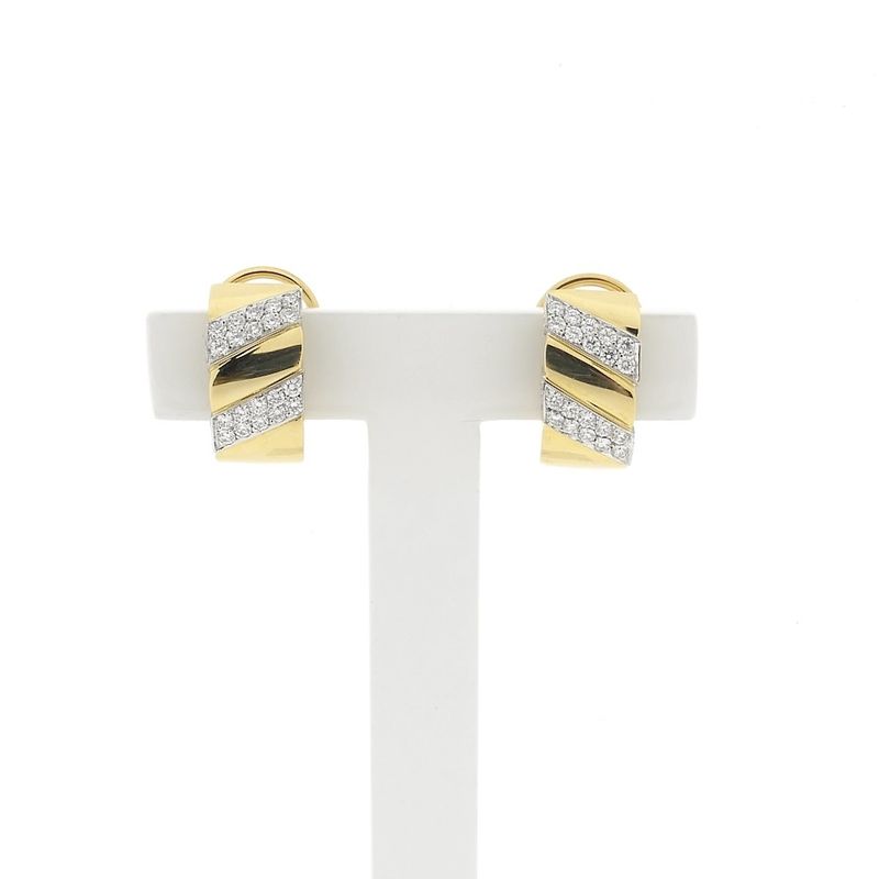 Image 1 of Gold stud earrings set with diamonds; 0.70 ct.