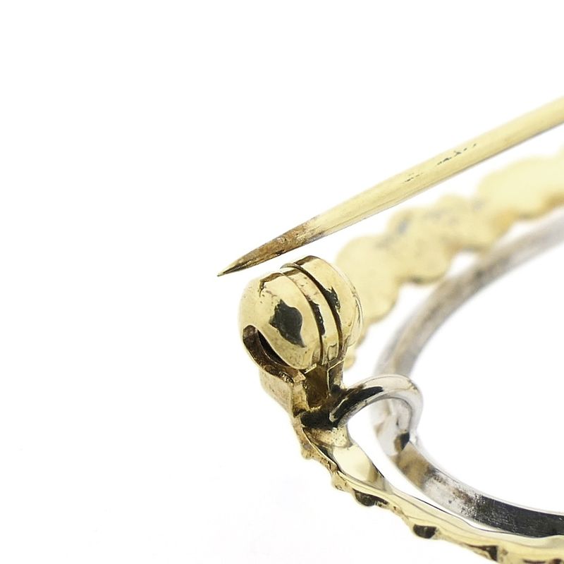 Image 8 of Two-tone gold brooch with diamond; 0.08 ct.