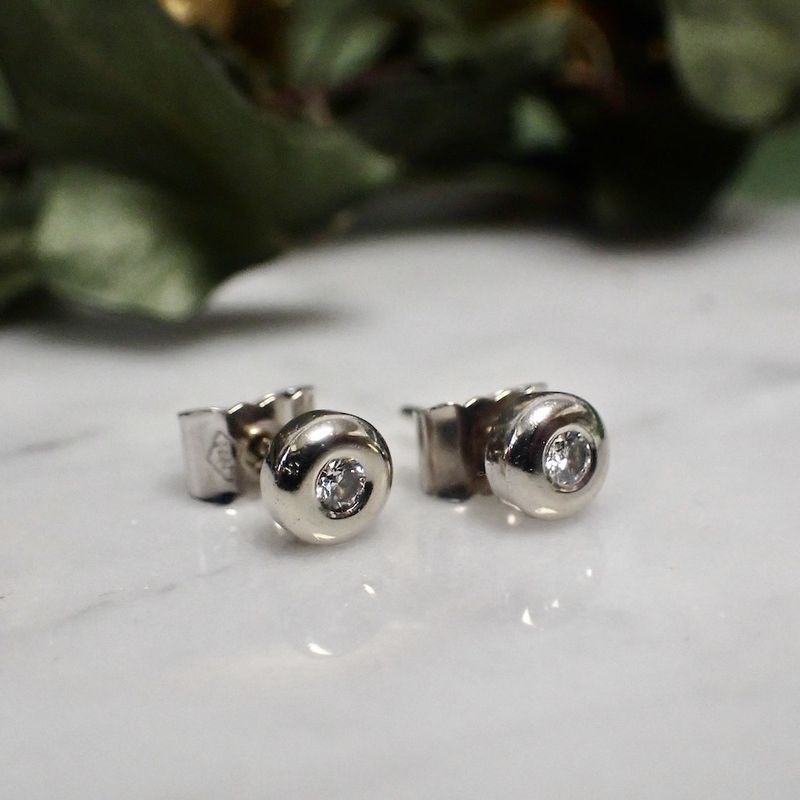 Image 6 of White gold solitaire stud earrings with diamond | 0.06 ct.