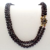 Antique garnet beaded sautoir with gold decorative clasp