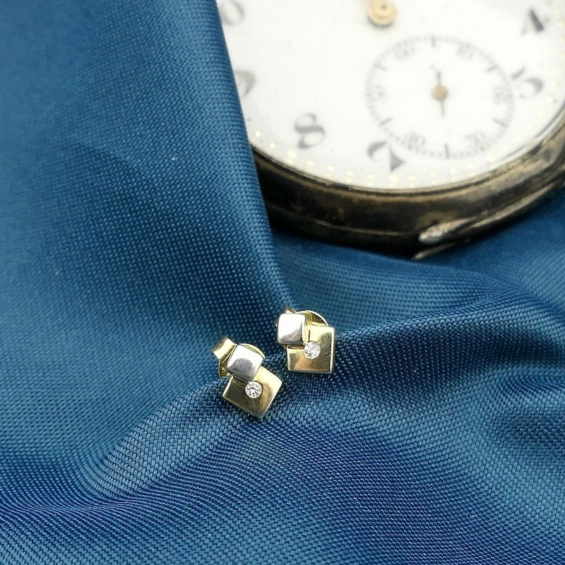 Image 5 of Bicolor gold stud earrings with zirconia