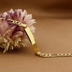 Afbeelding 2 van Gouden Figaroschakel kinderarmband met graveerplaatje | 13 – 16 cm
