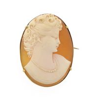 Antique gold brooch with cameo