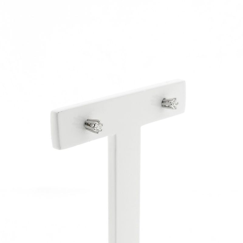 Image 3 of White gold solitaire stud earrings with 0.12 ct diamond.