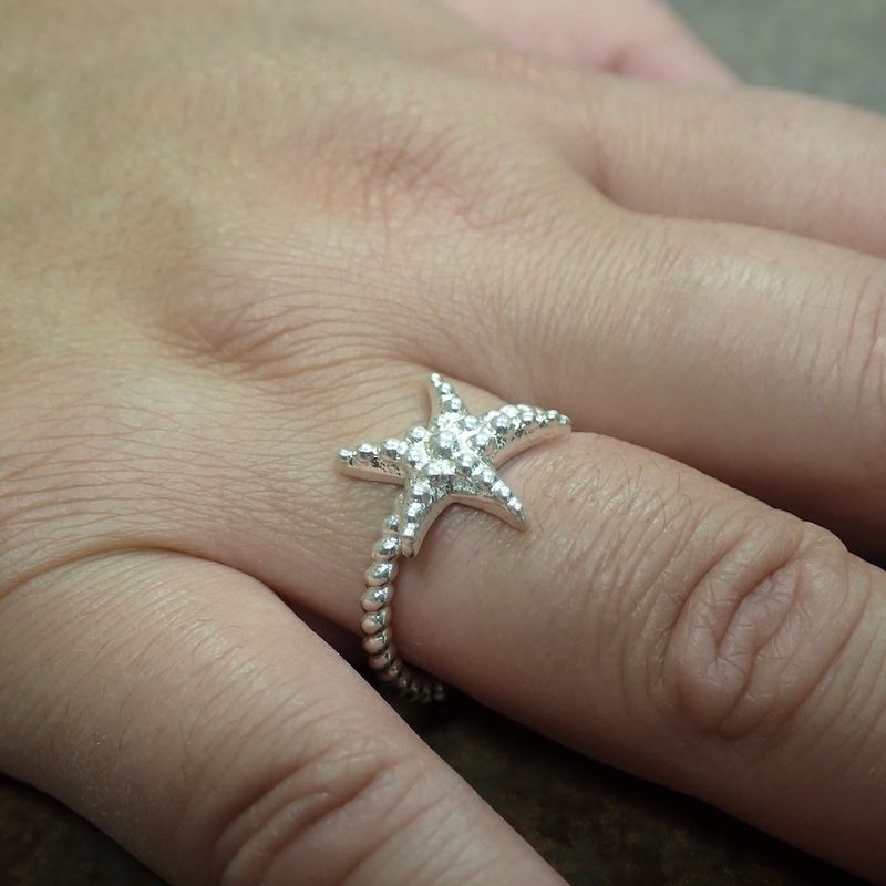 Image 2 of Silver ball ring with a starfish