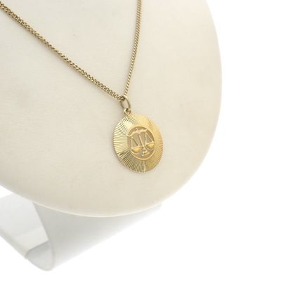 Gold pendant of the zodiac sign Libra Image 2 of Gold pendant of the zodiac sign Libra