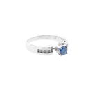 Image 6 of White gold solitaire ring with white and blue diamonds; 0.74 ct.