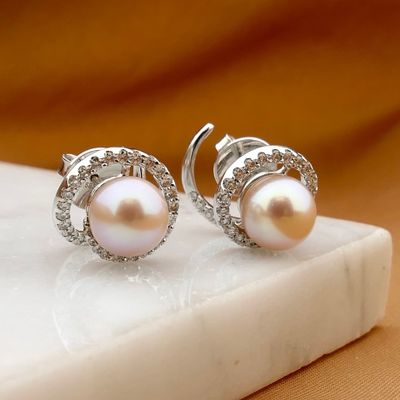 White gold stud earrings with Tahitian pearl and diamonds; approx. 0.64 ct. Image 2 of White gold stud earrings with Tahitian pearl and diamonds; approx. 0.64 ct.