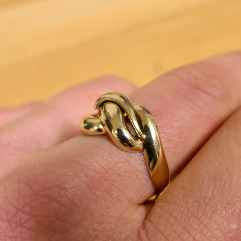 Image 10 of Gold ring with knotted design