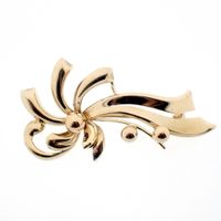 Golden fantasy brooch