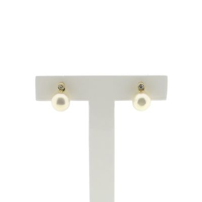 Gold stud earrings with pearl and diamond 0.05 ct. Image 1 of Gold stud earrings with pearl and diamond 0.05 ct.