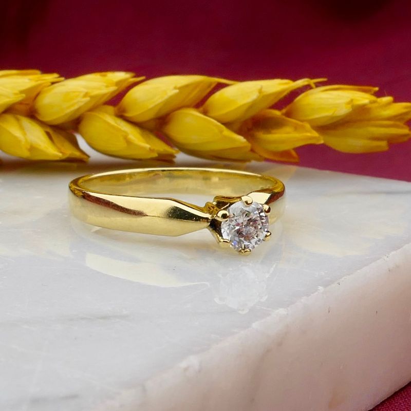 Image 2 of Gold (wedding) ring with diamond; 0.25 ct.