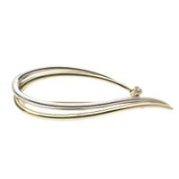 Two-tone fantasy brooch with diamond.