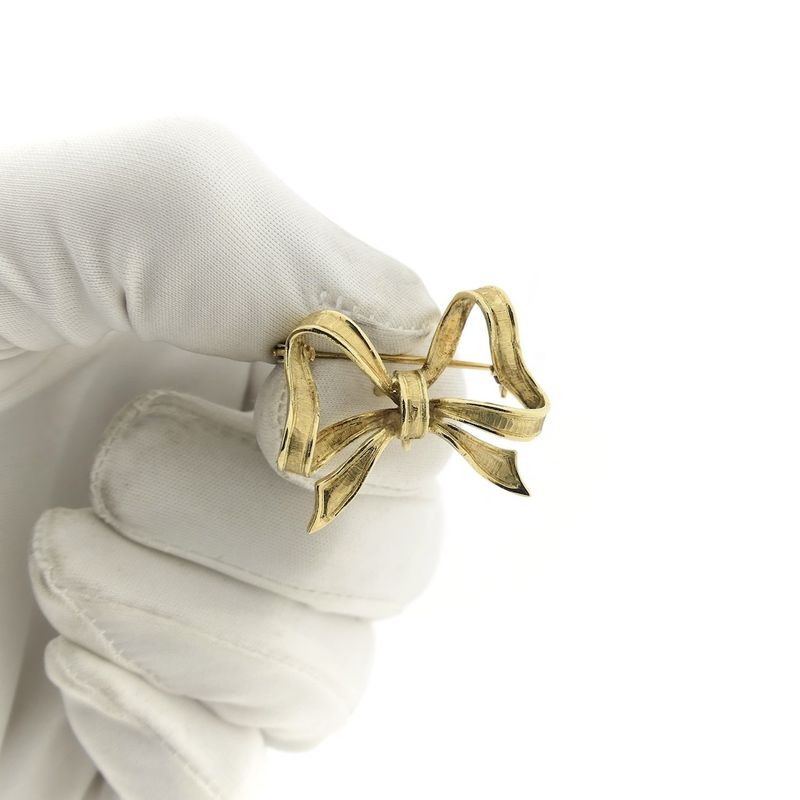 Image 12 of Gold brooch; Bow