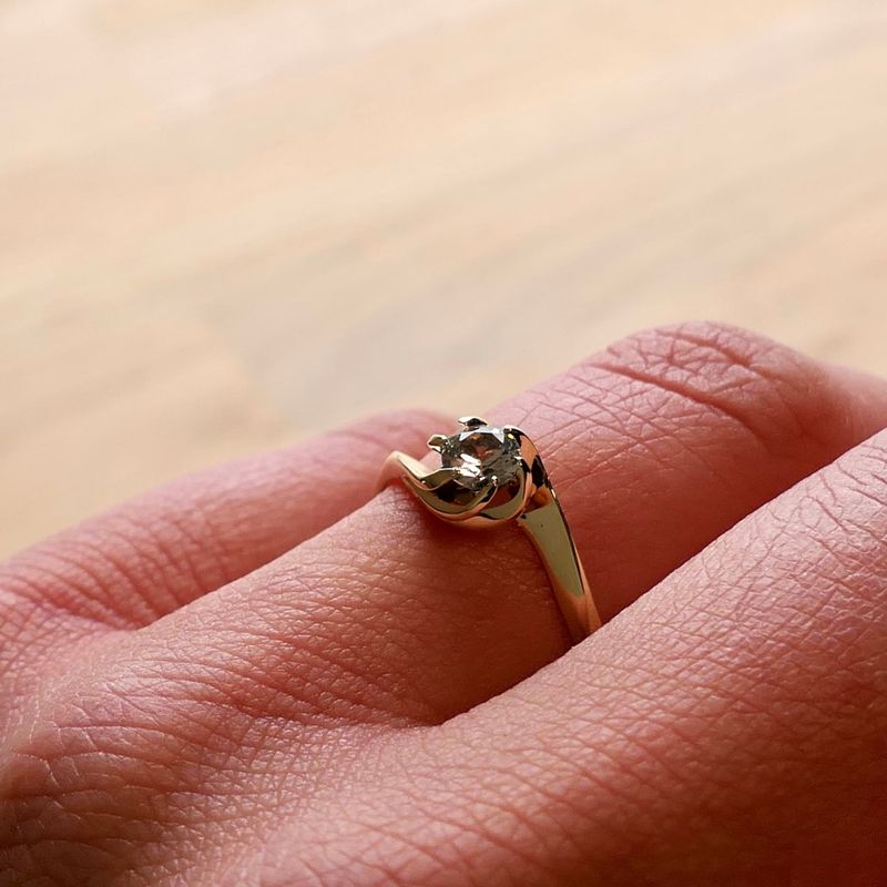 Image 10 of Golden solitaire ring with zirconia