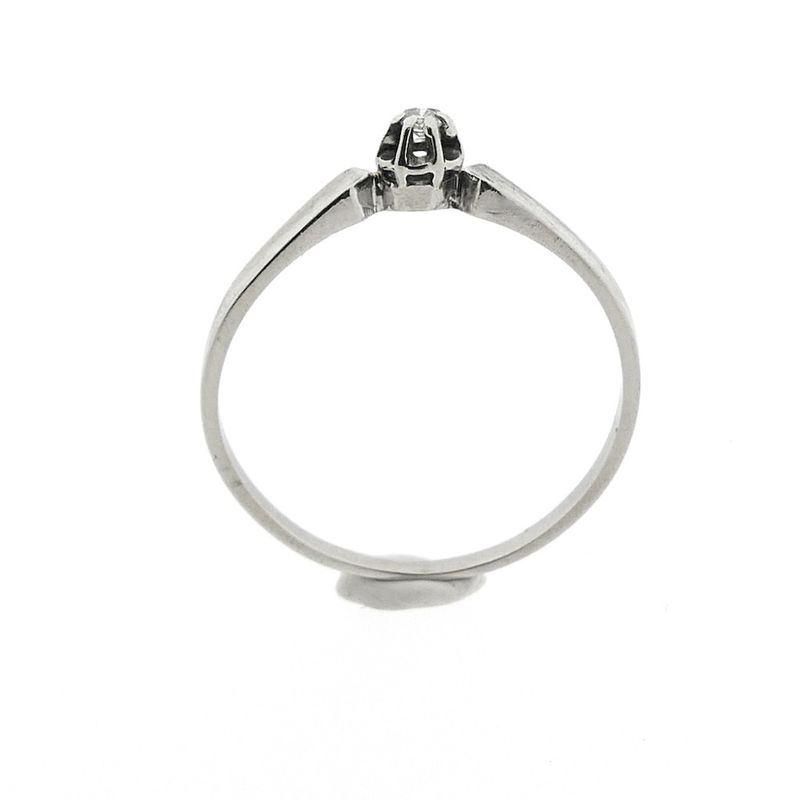 Image 4 of White gold solitaire ring with 0.02 ct diamond.