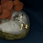 Image 2 of Two-tone gold brooch with ruby and diamonds; 0.06 ct.