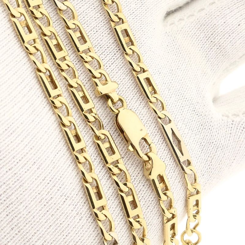 Afbeelding 8 van Gouden valkenoog schakelketting met witgouden wiebertjes
