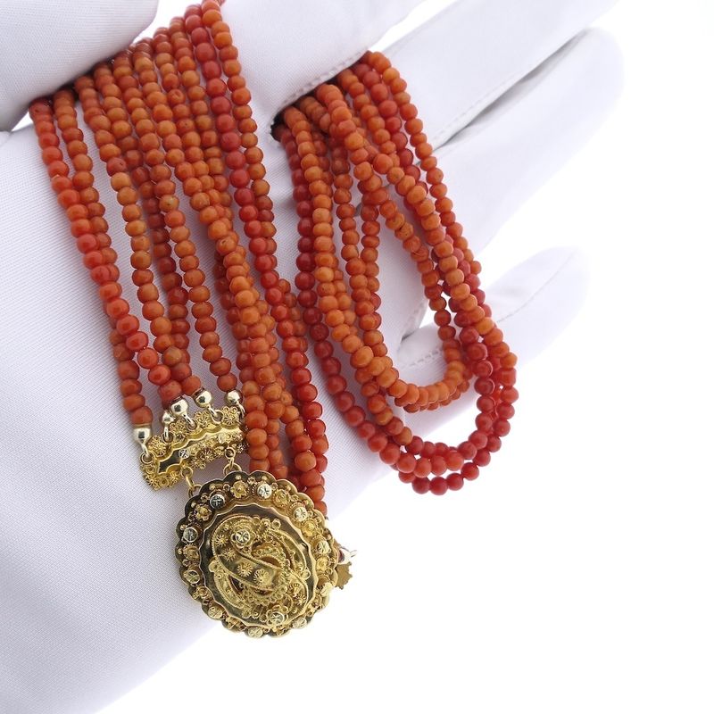 Image 11 of Antique necklace with blood coral and gold cap bell.