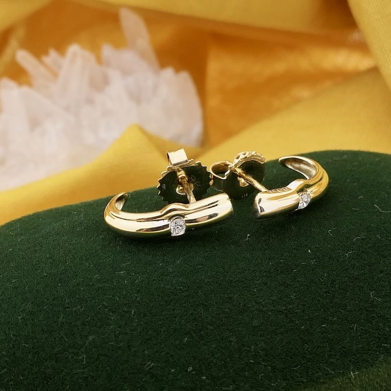 Image 2 of Gold stud earrings with diamond 0.06 ct.