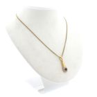 Image 5 of Gold pendant with synthetic ruby ​​and zirconia.