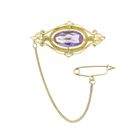 Image 1 of Gold brooch with amethyst.