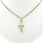 Image 6 of Gold pendant of a cross with pattern.