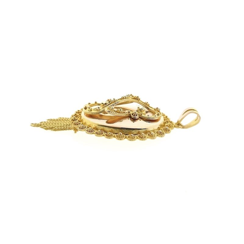 Image 6 of gold pendant of a hat bell