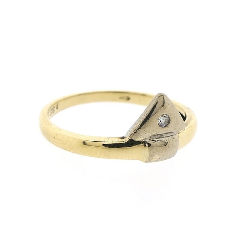 Image 5 of Two-tone gold solitaire ring with 0.015 ct diamond.