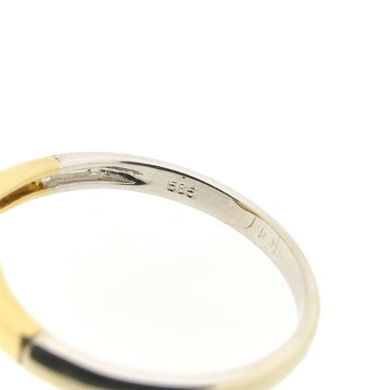 Image 6 of Two-tone gold solitaire ring with 0.05 ct diamond.