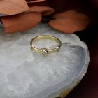 Image 2 of Gold solitaire ring with diamond 0.06 ct.