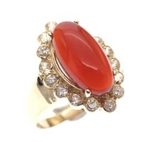 Gold ring with fire opal and zirconia