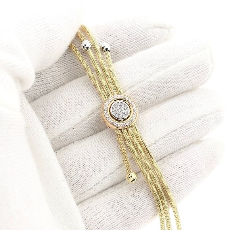 Afbeelding 8 van Tricolor gouden schakelarmband met zirconia