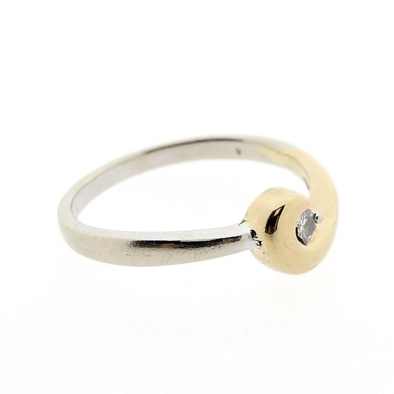 Image 5 of Two-tone gold solitaire ring with 0.035 ct diamond.