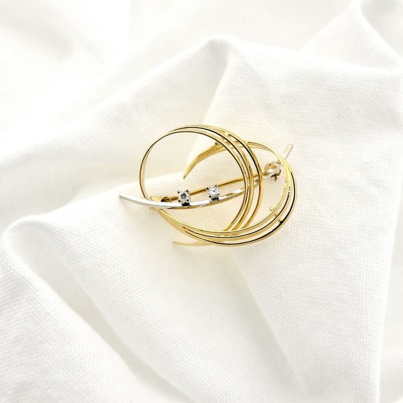 Image 8 of Two-tone gold fantasy brooch with diamonds; 0.02 ct.