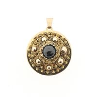 Antique gold pendant with garnet