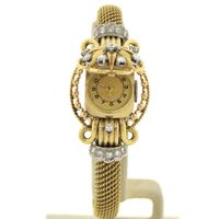 Swiss Geneva Bracelet/Cocktail Watch; 18k gold women's watch with diamonds