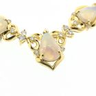 Image 10 of 18-karat gold necklace with a fixed pendant; Opal and diamond 0.46 ct. | 43 cm