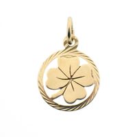 Gold pendant of a four-leaf clover