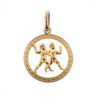 Gold pendant of the zodiac sign Gemini
