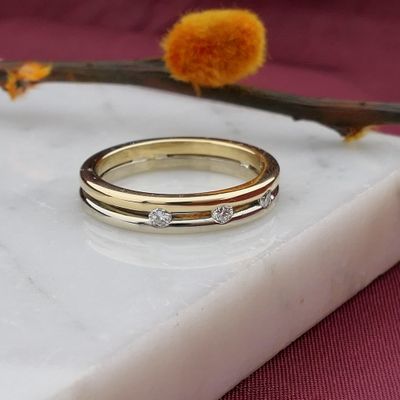 Two-tone gold ring with diamonds; 0.18 ct. Image 2 of Two-tone gold ring with diamonds; 0.18 ct.