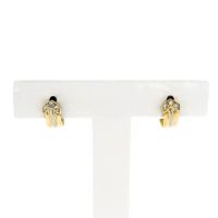 Bicolor gold stud earrings with diamonds; 0.03 ct.