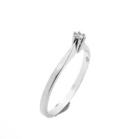 White gold solitaire ring with 0.04 ct diamond.