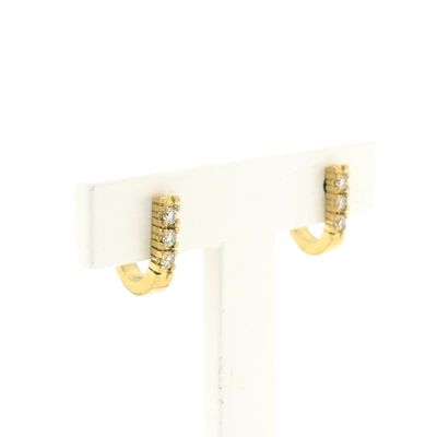 Image 2 of Gold stud earrings with diamonds