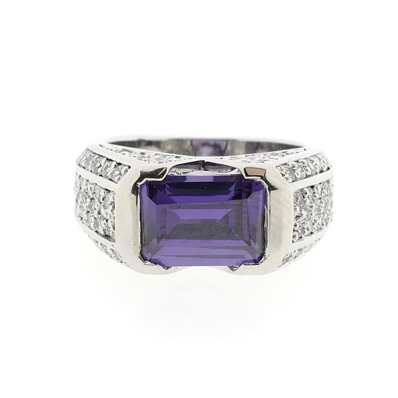 Image 5 of Silver ring with zirconia stones.