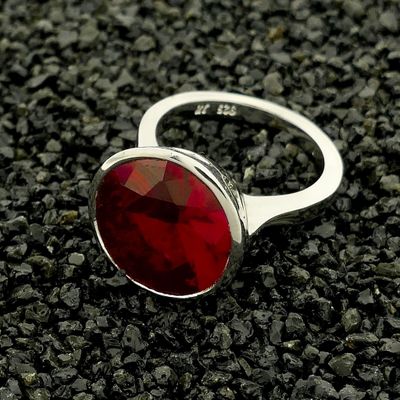 Image 2 of Silver ring with synthetic ruby.