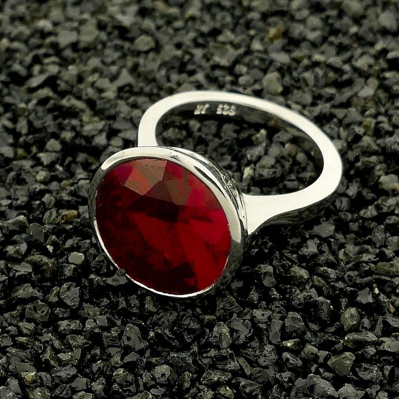 Image 2 of Silver ring with synthetic ruby.
