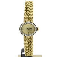 Rolex Precision; 18k gold ladies watch