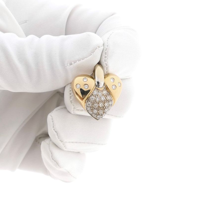 Image 10 of Bicolor gold heart pendant set with diamonds; Approx. 0.70 ct.