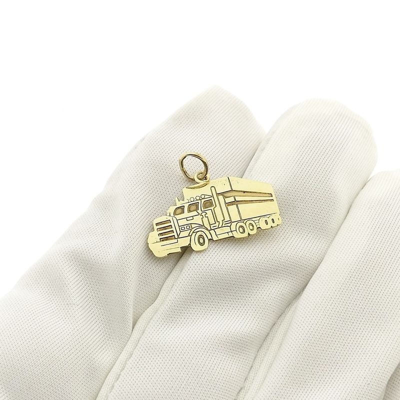 Image 2 of Gold pendant of a truck